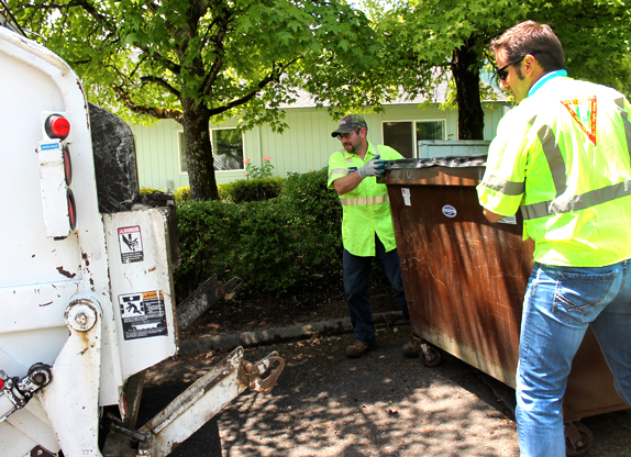 Hudson Garbage trash haulers collecting commercial trash.