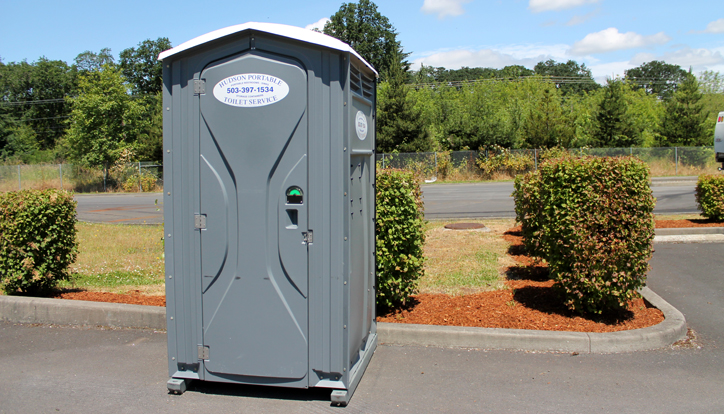 Picture of a Hudson Garbage portable toilet.